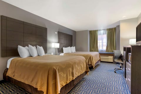 Premium bedding, iron/ironing board, free cribs/infant beds