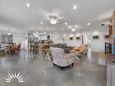 living area view to dining and kitchen