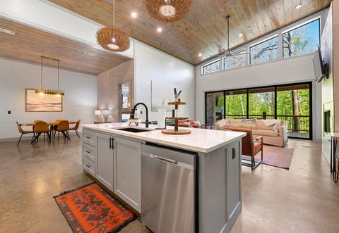 Where culinary magic happens—this kitchen is a modern chef's rustic dream, complete with state-of-the-art fittings