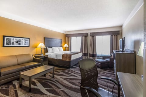 Suite, 1 King Bed, Non Smoking | Desk, blackout drapes, iron/ironing board, cribs/infant beds