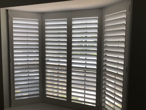 Plantation Shutters keeps room quiet & dark for restful sleep.