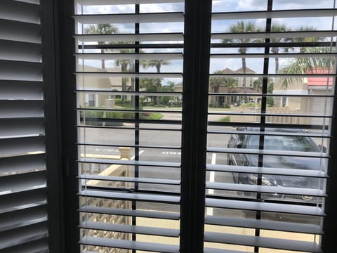 New Plantation Shutter Blinds keeps light out for a restful night of sleep. 