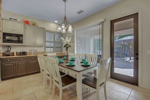 Take a break from the sun and enjoy your lunch inside at our dining table for 8.