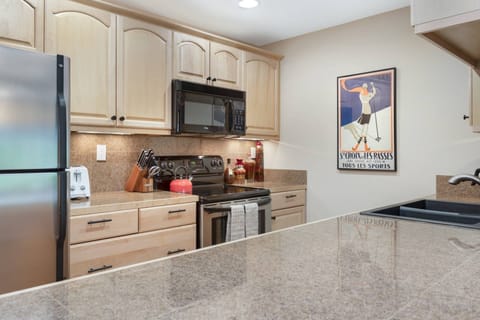 Kitchen is fully stocked with Drip Coffee Maker, Toaster, Blender, Hand Mixer, Tea Kettle and Knife Block
