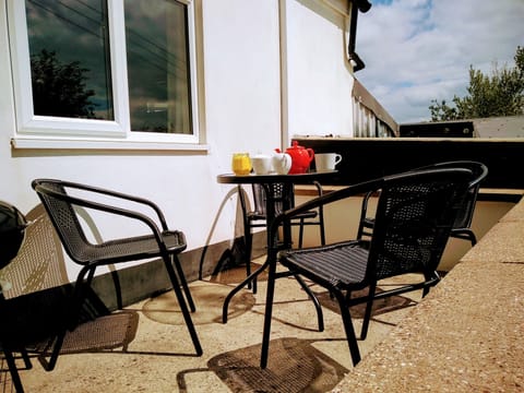 Rear Patio - Enjoy a drink and unwind