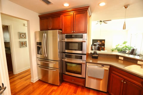 Kitchen, oven, microwave, dishwasher and bar top