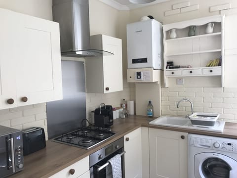 Design Apartment, 2 Bedrooms | Private kitchen | Fridge, microwave, oven, coffee/tea maker