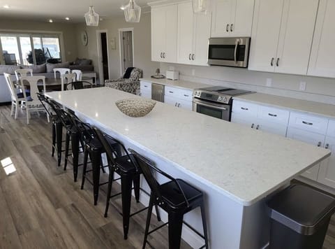 Main Kitchen Island, Gathering area and cook spot
