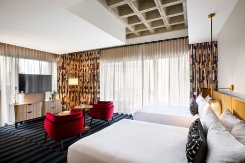 Room, 2 Queen Beds, City View | Minibar, iron/ironing board, free cribs/infant beds, free rollaway beds