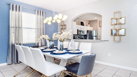 Elegant dining area with modern touches, perfect for stylish gatherings and memorable meals!
