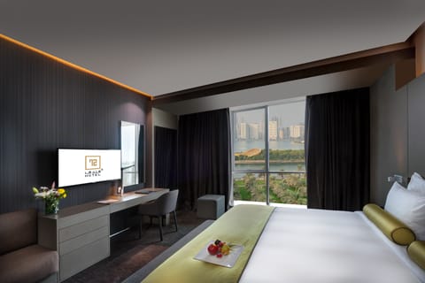 Premium Room, Lake View | Minibar, in-room safe, desk, blackout drapes