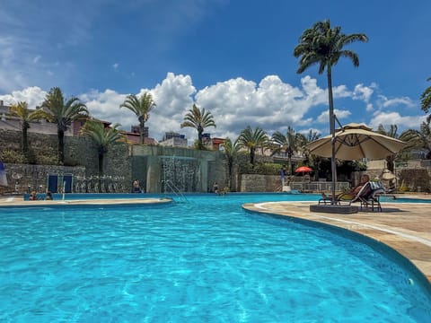 5 outdoor pools, open 8:00 AM to 8:00 PM, pool umbrellas, sun loungers