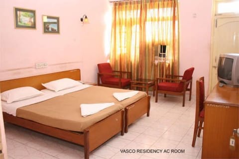 Room (with A/C) | Desk, bed sheets