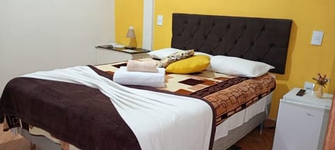 Economy Double Room | Bathroom | Shower, towels, soap, shampoo