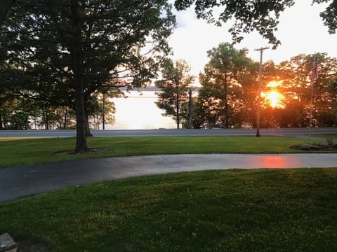 A short walk from the front yard, cross road, staircase to private lake area. 