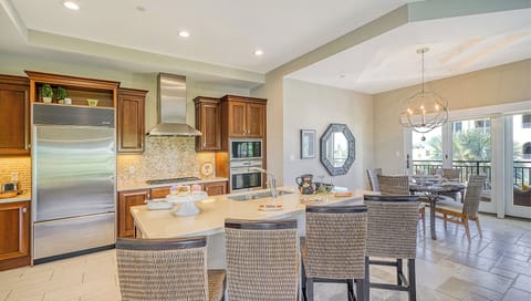 The heart of the home—perfect for snacks, drinks, or catching up after a beach day.