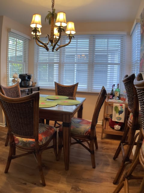 Dining area with bar cart and coffee bar