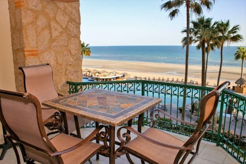 Balcony with pool view and ocean view