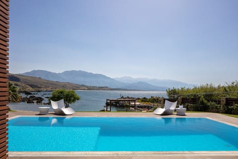 The pool terrace is equipped with comfortable, stylish sun beds and umbrellas!