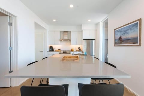 Each kitchen is equipped with everything you need to prepare a meal for your group, with quartz counter tops and breakfast bar seating for 6.