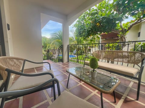 Jade Beach A6 has a covered balcony, set back from the community pool.