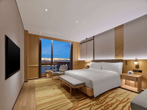 Deluxe Suite, 1 King Bed | Minibar, in-room safe, desk, laptop workspace