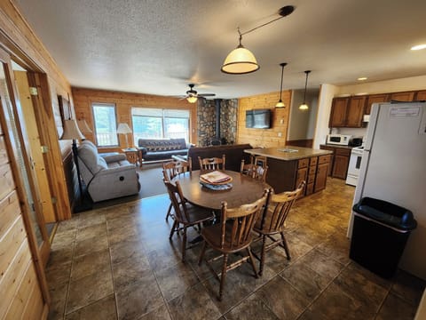 House, Multiple Beds, Patio | Living area | 32-inch TV with cable channels, fireplace