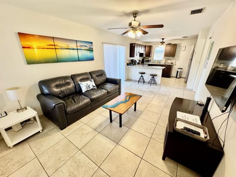 Bright open-concept living room and kitchen.