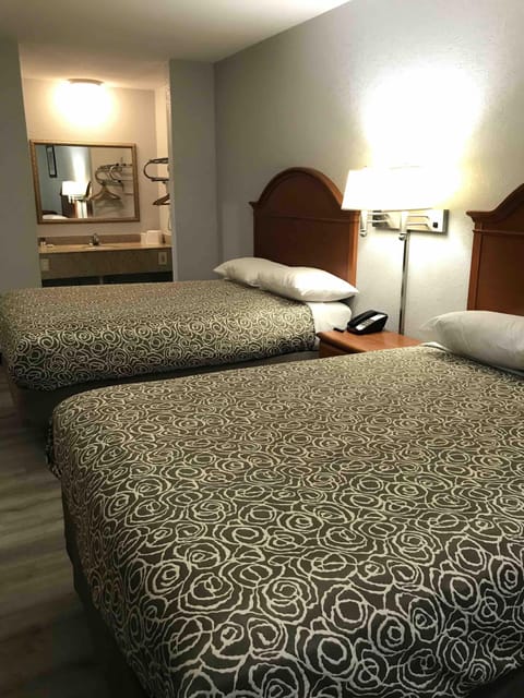 Basic Double Room, 2 Double Beds, Non Smoking | Individually furnished, desk, laptop workspace, blackout drapes