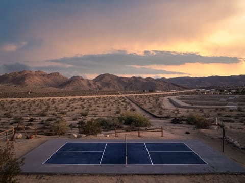 Yes! We put a court in the middle of nowhere. The mountains don`t judge your backhand.