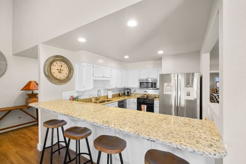 Gorgeous open concept kitchen with additional 4 seating at the counter.