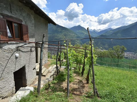 Cloud, Sky, Plant, Property, Window, Mountain, Land Lot, Biome, Landscape, Grass
