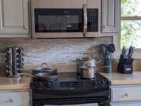 Pots, Pans, cooking utensils, spices, and oils, so you can cook your fav meals. 