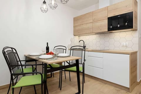 Fully equipped kitchenette with dining area.