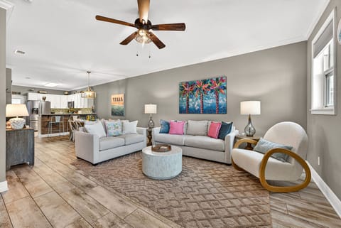Welcome to Seas the day! Sink into the plush couches, rock away in the cozy rocking chair or enjoy a cup of coffee from the loaded coffee bar!