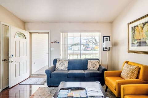 The bright, airy living room is a great place to relax any time.