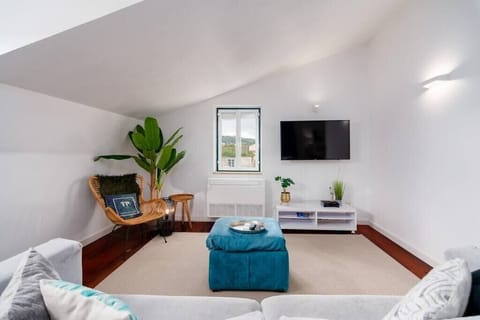 Sala de Estar com ar-condicionado.