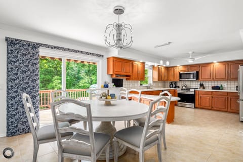 Our Kitchen seats 12 plus 4 additional stools for peninsula seating.