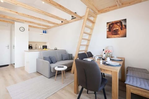 Dining area with wooden table.