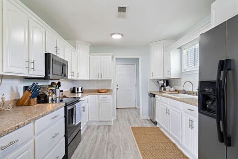 Whip up delicious meals in this charming kitchen