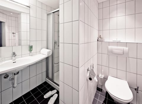 Shower, free toiletries, hair dryer, towels