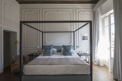 Premium bedding, down comforters, pillowtop beds, minibar