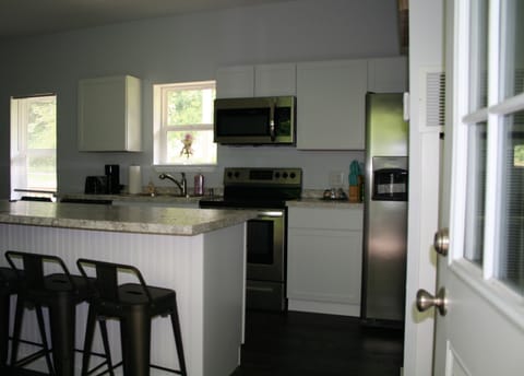 Have a seat at one of the four counter-height stools