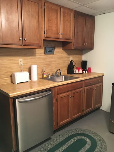 YES! There is a dishwasher!  Dual purpose coffee - auto drip or pods, you choose