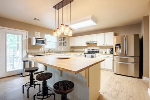 Large kitchen stocked with kitchenware.  Includes complimentary coffee and tea. 