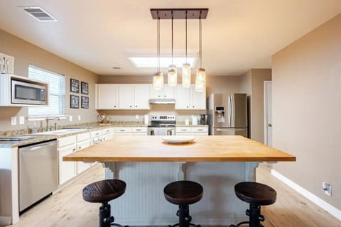 Large kitchen stocked with kitchenware.  Includes complimentary coffee and tea. 