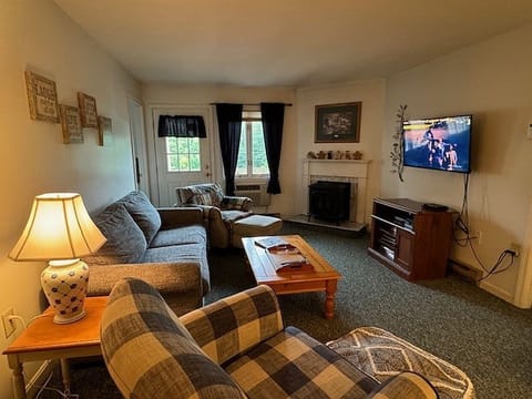 Living Room with Cozy Gas Log Fireplace