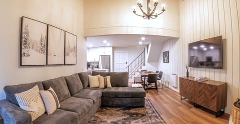 Living Room opens to dining area and kitchen.