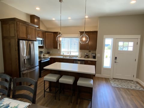 Step in the front door to the bright kitchen. 