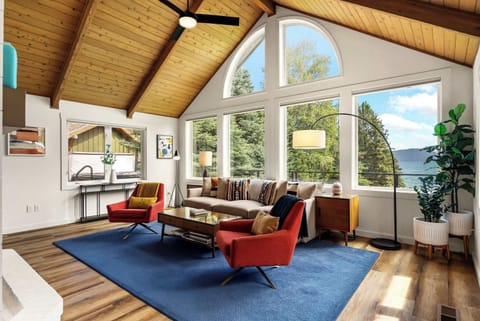 Spacious living room with plenty of natural light and curated furniture